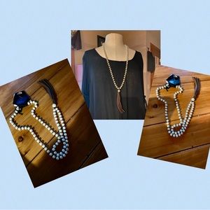 Striking pearl necklace w leather tassel!